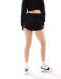 Фото #4 товара Tommy Jeans badge knit shorts in black