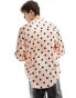 ASOS DESIGN relaxed satin polka dot shirt with extended cuffs in dusty pink