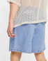 ASOS DESIGN denim shorts with front pleat in mid wash