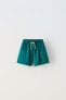 Water-repellent bermuda shorts with contrast drawstrings