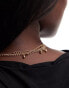 Фото #3 товара ASOS DESIGN Curve multirow necklace with snake and celestial design in gold tone