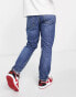 Фото #4 товара HUGO 634 tapered fit jeans in medium blue