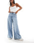 Фото #1 товара ASOS DESIGN Petite soft wide leg jean in light wash