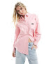 Фото #1 товара Tommy Jeans badge boyfriend shirt in pink