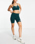 The North Face Training seamless high waist legging shorts in green Exclusive at ASOS