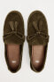 Split suede loafers with tassels