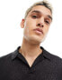 ASOS DESIGN muscle long sleeve polo in black glitter rib with revere collar