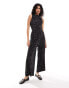 ASOS DESIGN plisse sleeveless high neck wide leg jumpsuit in mono polka dot