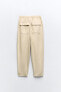 Trousers with an elasticated waistband