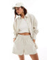 Фото #1 товара ASOS DESIGN oversized shirt with cutabout panels in structured stripe