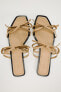 Flat slider sandals with bows