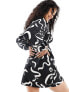 Wednesday's Girl deep v swirl print mini dress in black and white