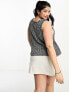 Фото #1 товара ASOS DESIGN Curve relaxed knitted tank top in open stitch in black