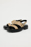 Asymmetric leather sandals