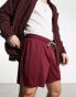 ASOS DESIGN oversized shorts in burgundy sporty mesh