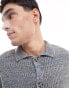 ASOS DESIGN knitted button through polo in blue twist