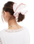 ASOS DESIGN scrunchie with plisse detail in white with red edges