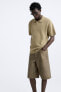 Фото #9 товара Джинсовые шорты с принтом с эффектом потертости ZARA