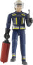 Фото #1 товара Фигурка Bruder Пожарный с аксессуарами, включая шлем, перчатки и фейерверк.