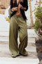 Palazzo trousers with shiny fabric