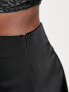 ASOS DESIGN satin mini skirt with curved hem in black