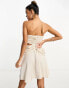 ASOS DESIGN satin bandeau drape twist mini dress with cut out detail in gold