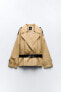 Short contrast trench coat