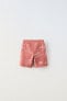 Printed plush bermuda shorts