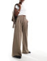 Stradivarius super wide leg pleat front trousers in beige