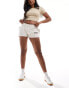 Фото #3 товара Superdry Sportswear logo racer shorts in rice white