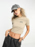 Dickies aitkin left chest varsity logo crop baby t-shirt in beige exclusive to asos