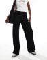 Фото #1 товара Bershka textured wide leg trousers in black