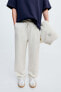 True neutrals plush trousers with darts