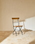 Wooden and metal folding chair