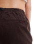 Gramicci cotton twill shorts with strap buckle in brown