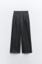 Full-length pleated trousers