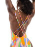 ASOS DESIGN lattice strap swimsuit with high leg in vibrant abstract print