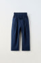 Garment dye trousers with elasticated waistband