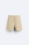Textured openwork bermuda shorts