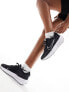 Nike Running Interact Run trainers in black and white