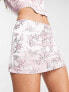 Reclaimed Vintage low rise mini skirt in pink jaquard