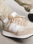 New Balance 237 trainers in beige and oatmeal