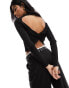 Pimkie open twist back high neck jumper in black