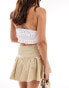 Фото #4 товара ASOS DESIGN dropped waist cotton mini skirt in khaki