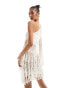 Фото #4 товара In The Style crochet one sleeve fringe detail mini dress in cream