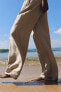 Wide-leg long length trousers