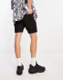 Фото #3 товара ASOS DESIGN skinny chino shorts in mid length in black