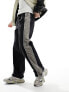 Фото #7 товара ASOS DESIGN baggy nylon track pants in black with grey side stripe