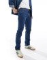 Levi's 511 slim fit performance cool denim jeans in mid blue Голубой, W33 L34 - фото #4