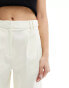 ASOS DESIGN barrel leg chino trouser with button tab detail in cream